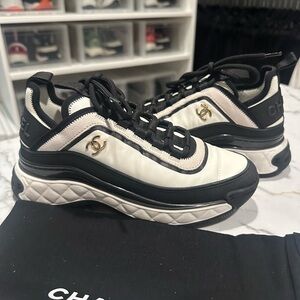 CHANEL Black, White and Gold Quilted-Trim Sneakers